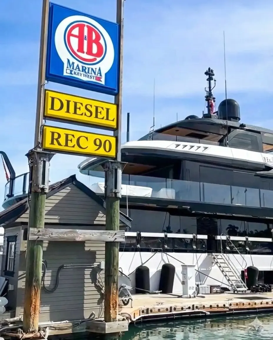 View of Catamaran docked at A$B Marina behind the sign